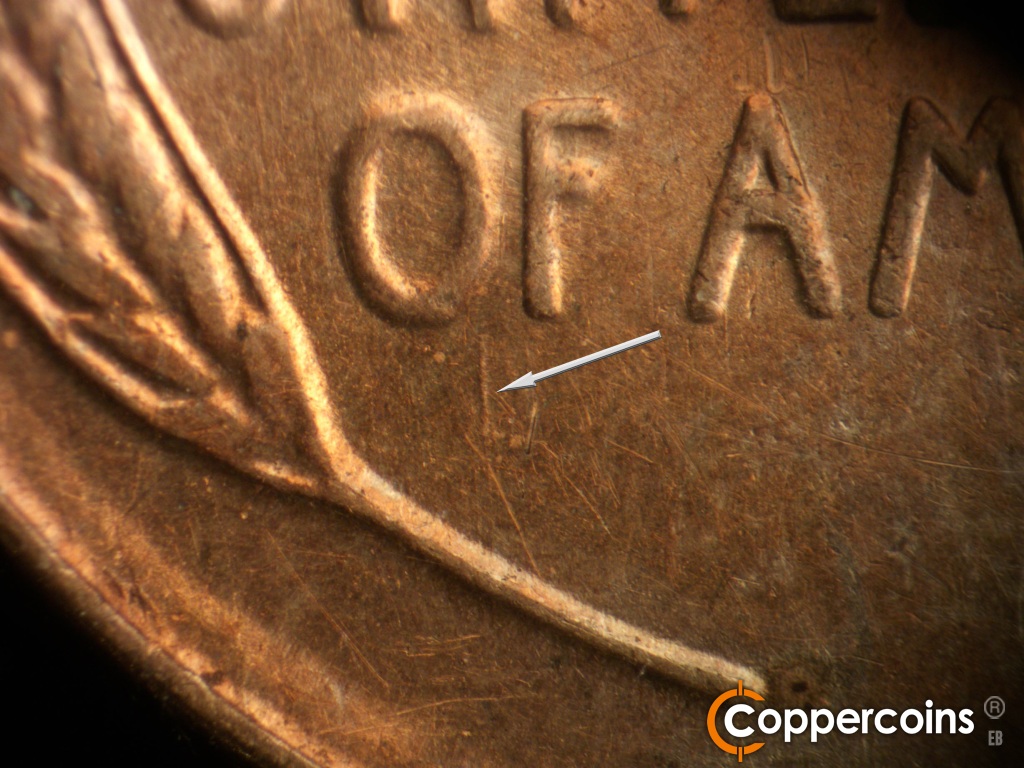 Die-stage B marker on 1929S•1MM•001 showing Die scratch under OF.