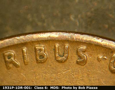 Die-stage B marker on 1931P•1DR•001 (1931 Doubled Die Reverse).