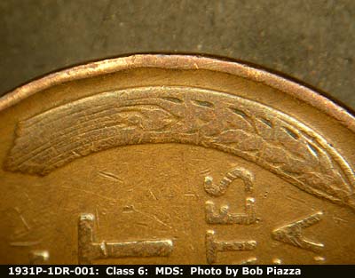 Die-stage B marker on 1931P•1DR•001 (1931 Doubled Die Reverse).