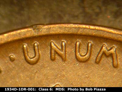 Die-stage B marker on 1934D•1DR•001 (1934 Doubled Die Reverse).