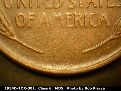 Die-stage B marker on 1934D•1DR•001 (1934 Doubled Die Reverse).