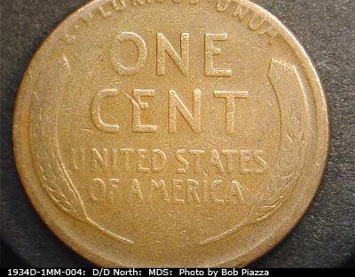 Die-stage B marker on 1934D•1MM•004 (1934 Repunched Mint Mark).