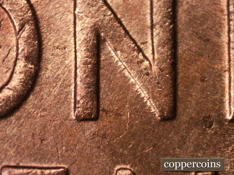 Die-stage A marker on 1934D•1MM•005 (1934 Repunched Mint Mark).
