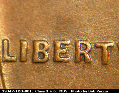 Die-stage B marker on 1934P•1DO•001 (1934 Doubled Die Obverse).