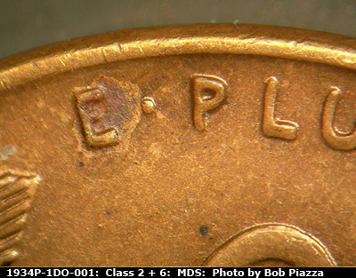 Die-stage B marker on 1934P•1DO•001 (1934 Doubled Die Obverse).