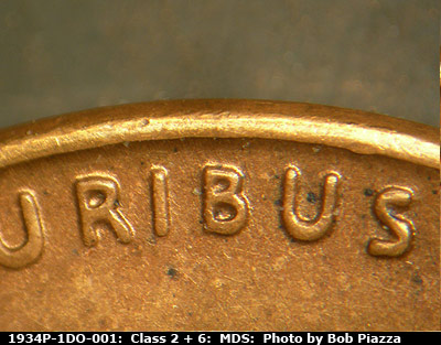 Die-stage B marker on 1934P•1DO•001 (1934 Doubled Die Obverse).