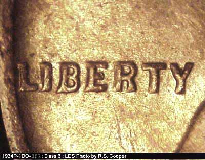 Die-stage C marker on 1934P•1DO•003 (1934 Doubled Die Obverse).