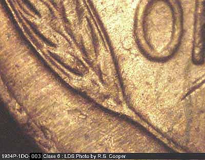 Die-stage C marker on 1934P•1DO•003 (1934 Doubled Die Obverse).