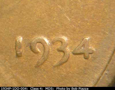 Die-stage B marker on 1934P•1DO•004 (1934 Doubled Die Obverse).