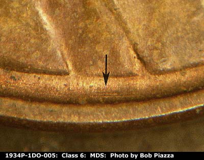 Die-stage B marker on 1934P•1DO•005 (1934 Doubled Die Obverse).