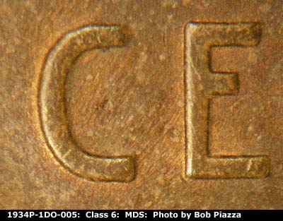 Die-stage B marker on 1934P•1DO•005 (1934 Doubled Die Obverse).