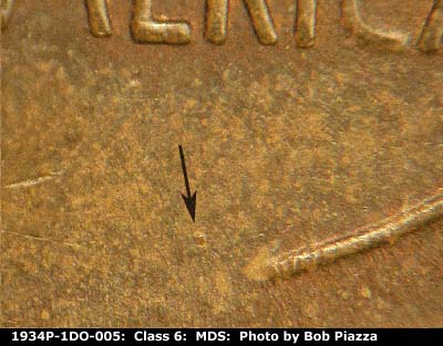 Die-stage B marker on 1934P•1DO•005 (1934 Doubled Die Obverse).
