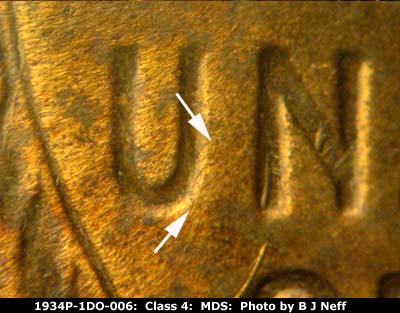Die-stage B marker on 1934P•1DO•006 (1934 Doubled Die Obverse).