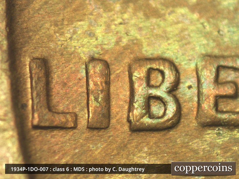 Die-stage B marker on 1934P•1DO•007 (1934 Doubled Die Obverse).