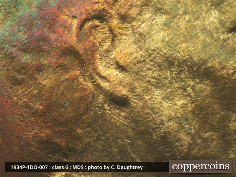 Die-stage B marker on 1934P•1DO•007 (1934 Doubled Die Obverse).