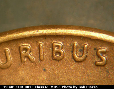 Die-stage B marker on 1934P•1DR•001 (1934 Doubled Die Reverse).