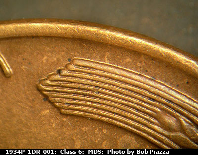 Die-stage B marker on 1934P•1DR•001 (1934 Doubled Die Reverse).