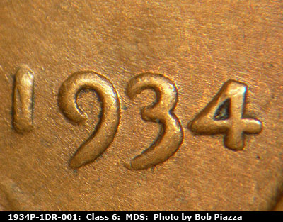 Die-stage B marker on 1934P•1DR•001 (1934 Doubled Die Reverse).