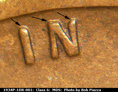 Die-stage B marker on 1934P•1DR•001 (1934 Doubled Die Reverse).