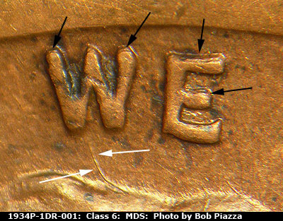 Die-stage B marker on 1934P•1DR•001 (1934 Doubled Die Reverse).