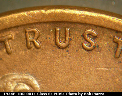 Die-stage B marker on 1934P•1DR•001 (1934 Doubled Die Reverse).