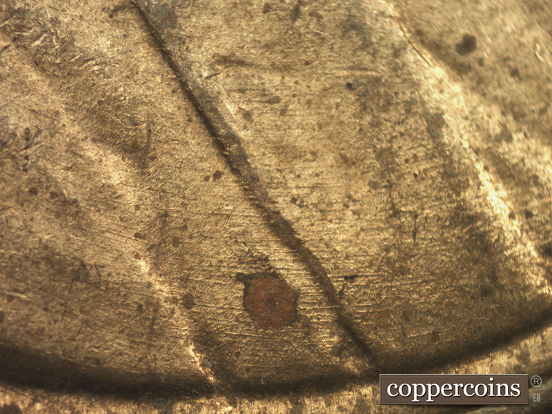 Die-stage B marker on 1934P•1DR•002 (1934 Doubled Die Reverse).