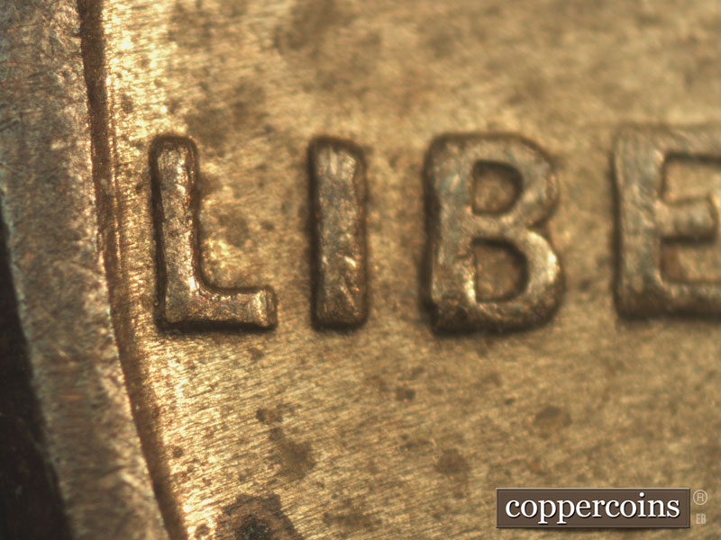 Die-stage B marker on 1934P•1DR•002 (1934 Doubled Die Reverse).