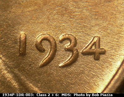Die-stage B marker on 1934P•1DR•003 (1934 Doubled Die Reverse).