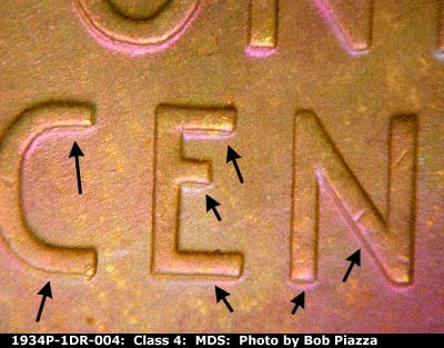 Die-stage B marker on 1934P•1DR•004 (1934 Doubled Die Reverse).