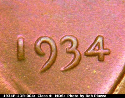 Die-stage B marker on 1934P•1DR•004 (1934 Doubled Die Reverse).