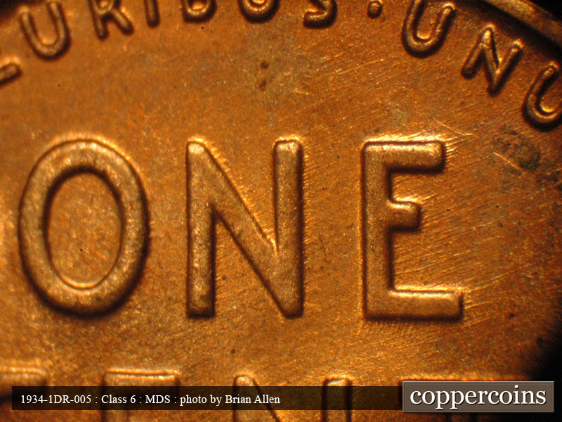 Die-stage B marker on 1934P•1DR•005 (1934 Doubled Die Reverse).