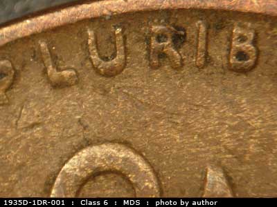 Die-stage B marker on 1935D•1DR•001 (1935 Doubled Die Reverse).