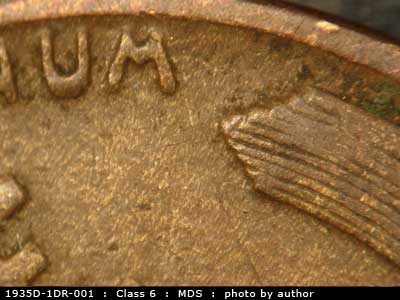 Die-stage B marker on 1935D•1DR•001 (1935 Doubled Die Reverse).
