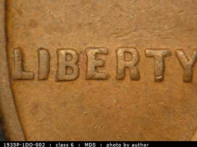 Die-stage B marker on 1935P•1DO•002 (1935 Doubled Die Obverse).