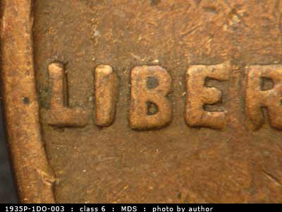 Die-stage B marker on 1935P•1DO•003 (1935 Doubled Die Obverse).