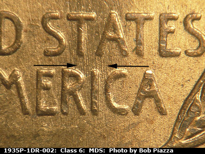 Die-stage B marker on 1935P•1DR•002 (1935 Doubled Die Reverse).
