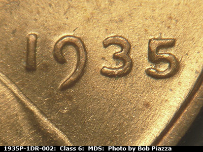 Die-stage B marker on 1935P•1DR•002 (1935 Doubled Die Reverse).
