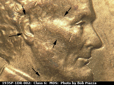 Die-stage B marker on 1935P•1DR•002 (1935 Doubled Die Reverse).