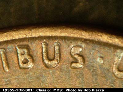 Die-stage B marker on 1935S•1DR•001 (1935 Doubled Die Reverse).