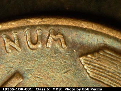 Die-stage B marker on 1935S•1DR•001 (1935 Doubled Die Reverse).