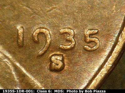 Die-stage B marker on 1935S•1DR•001 (1935 Doubled Die Reverse).