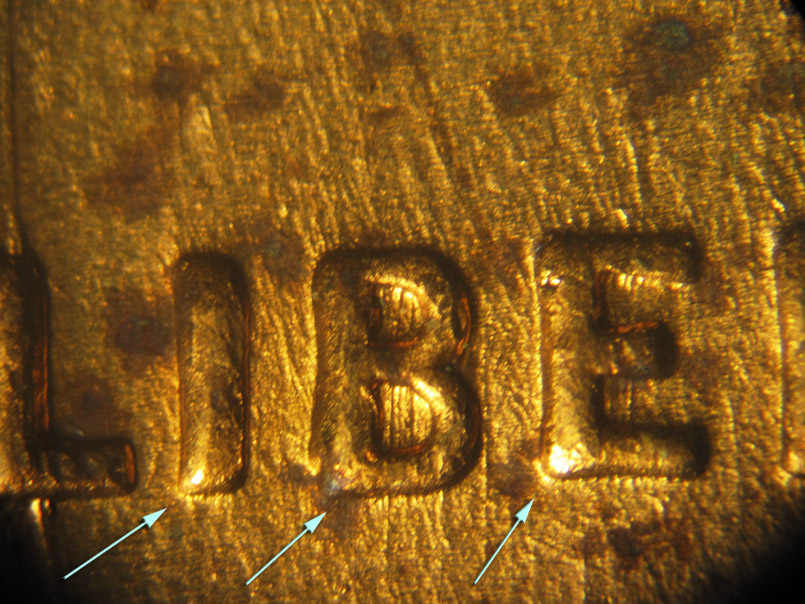 Die-stage B marker on 1936P•1DO•012 (1936 Doubled Die Obverse).