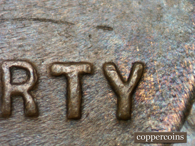 Die-stage B marker on 1936P•1DO•013 (1936 Doubled Die Obverse).