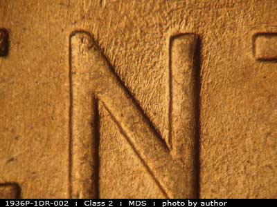 Die-stage B marker on 1936P•1DR•002 (1936 Doubled Die Reverse).