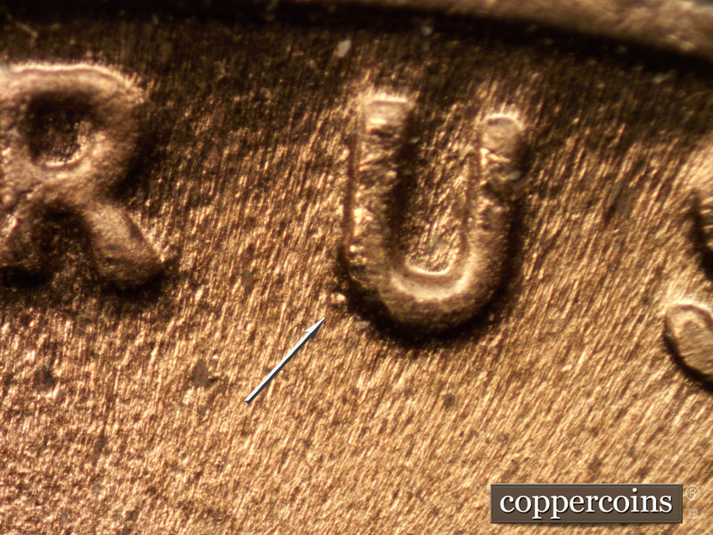 Die-stage C marker on 1936P•1DR•004 (1936 Doubled Die Reverse).
