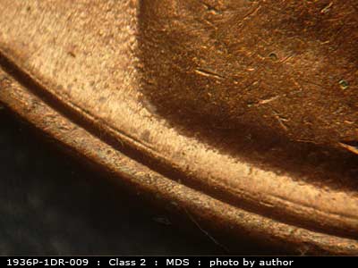 Die-stage B marker on 1936P•1DR•009 (1936 Doubled Die Reverse).