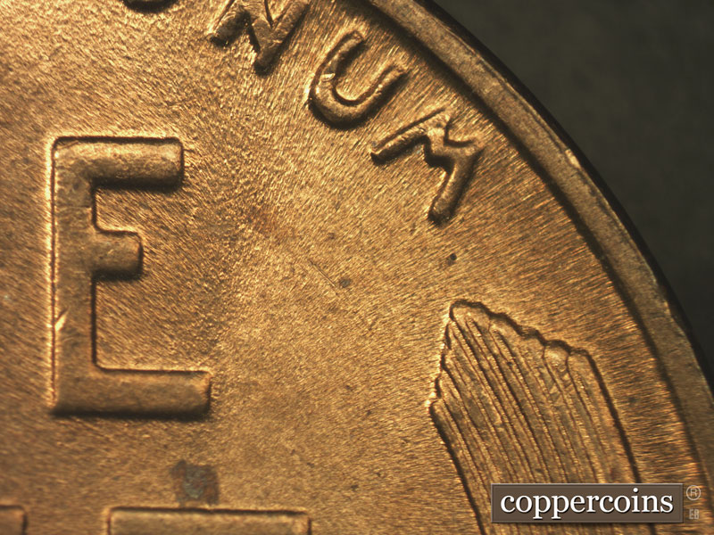 Die-stage B marker on 1936P•1DR•011 (1936 Doubled Die Reverse).