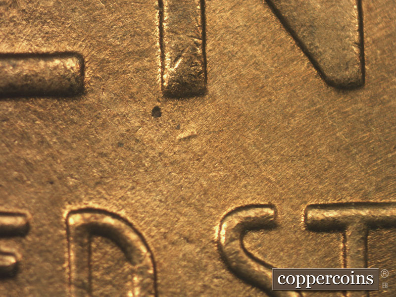 Die-stage B marker on 1936P•1DR•011 (1936 Doubled Die Reverse).