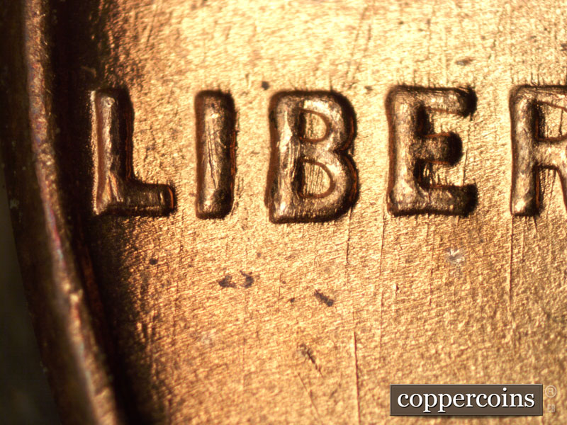 Die-stage A marker on 1937D•1DO•002 (1937 Doubled Die Obverse).
