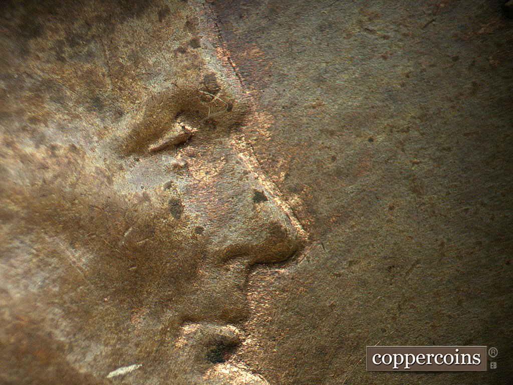 Die-stage B marker on 1937D•1DO•005 showing Close up of extra eyelid.